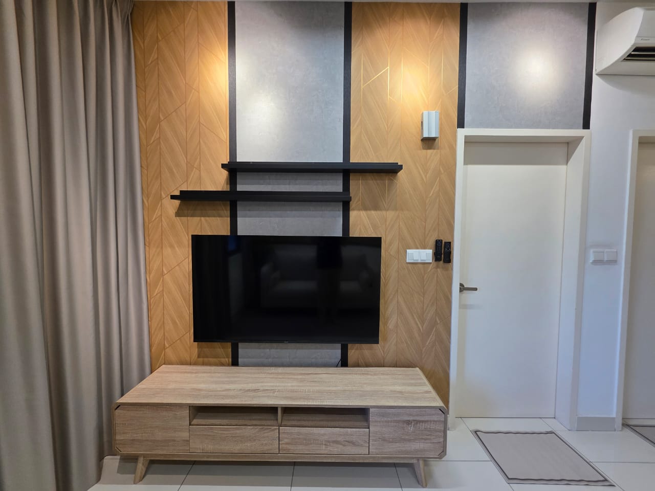 Feature TV wall · timber chevron with floating shelves